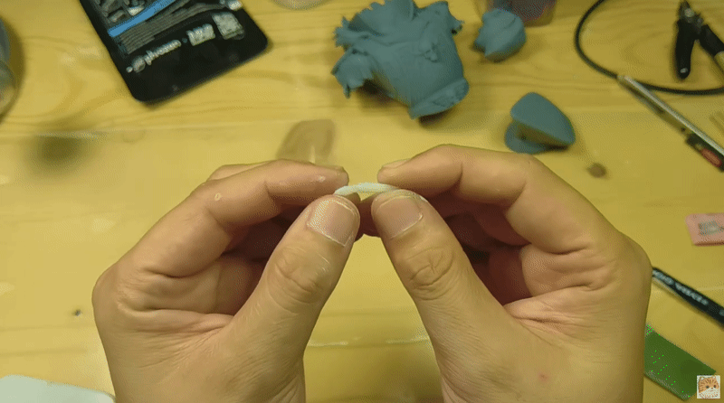 Breaking a small rolled piece of the cured Light Curing Putty