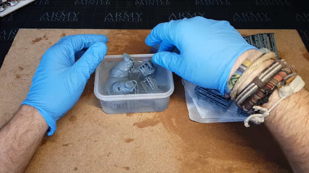 Cleaning leftover resin from 3D printed miniature model