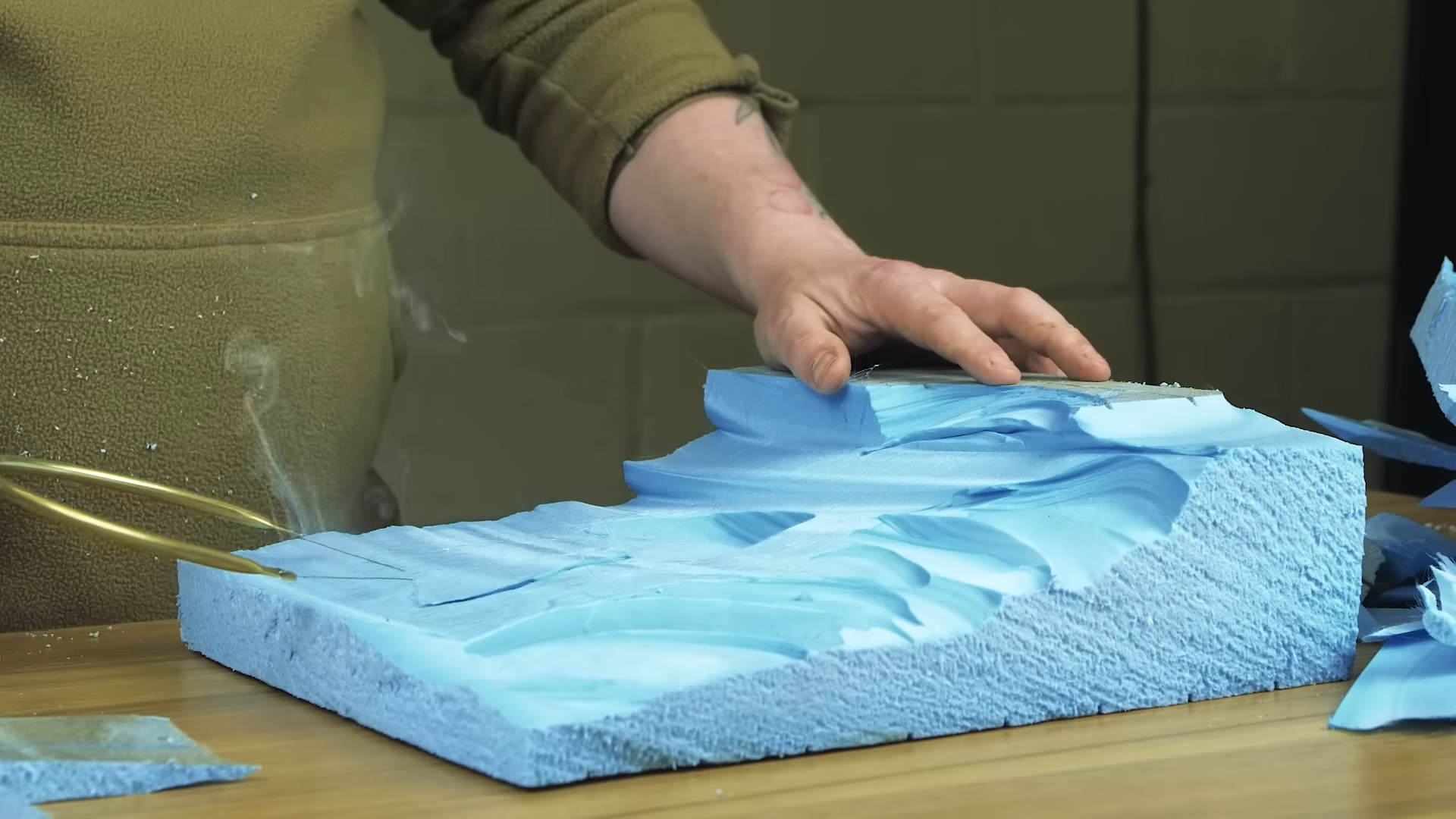 Making terrain base for his miniature diorama