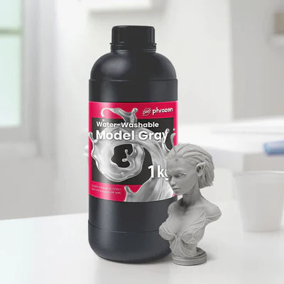 A bottle of water washable resin with a female bust 3D model created using it.