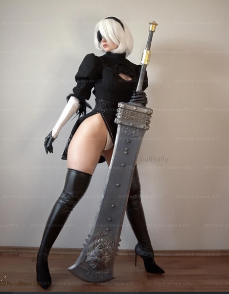 A cosplayer wearing an eye patch holding a huge 3D printed cosplay sword