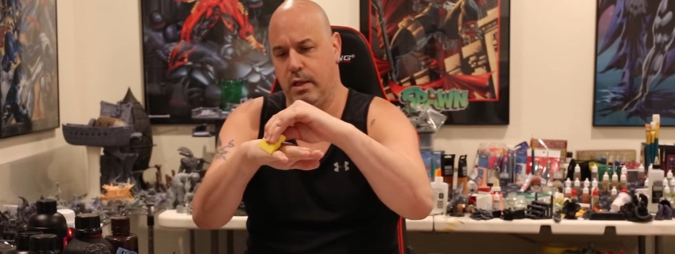 Greg shows how to squeegee leftover resin on the top of a building plate