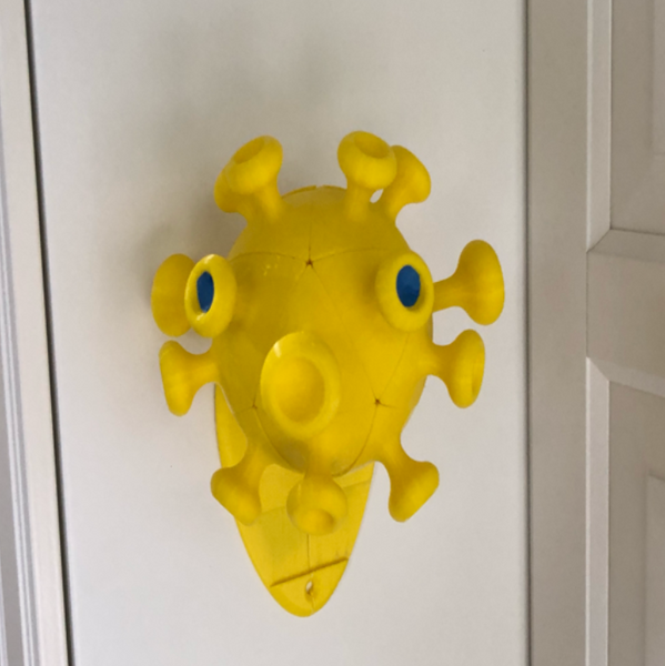 Cool 3D printed stuff PPE holder shaped like a virus, perfect for desks or wall mounting