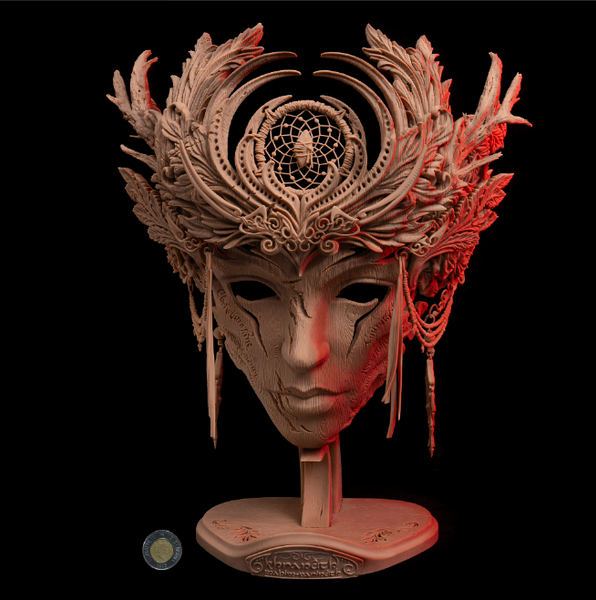 Cool 3D printed Elven mask with a mystical design and light-up stand for display.