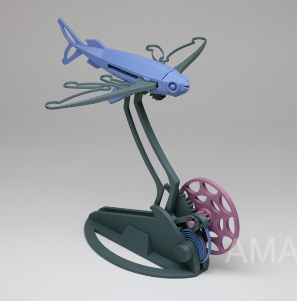 Cool 3D printed kinetic sculpture of a fish in motion, designed with moving parts for a fun mechanical effect.