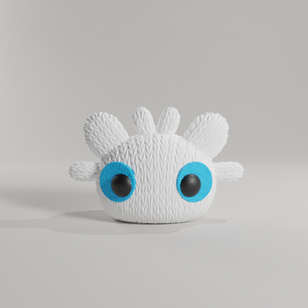 白いボディと青い目を持つToothless Face Crochetのキーホルダー。販売向け3Dプリント製品の一例。