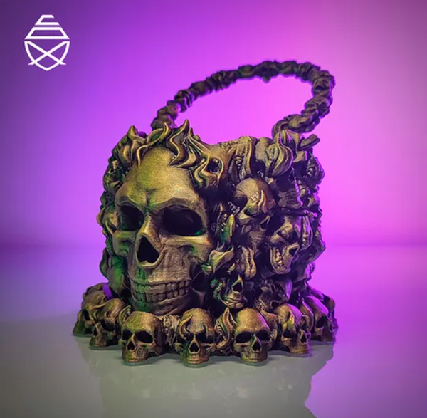 A gothic 3D-printed skull decoration, adorned with smaller skulls and intricate details, with a purple background for a haunting effect.