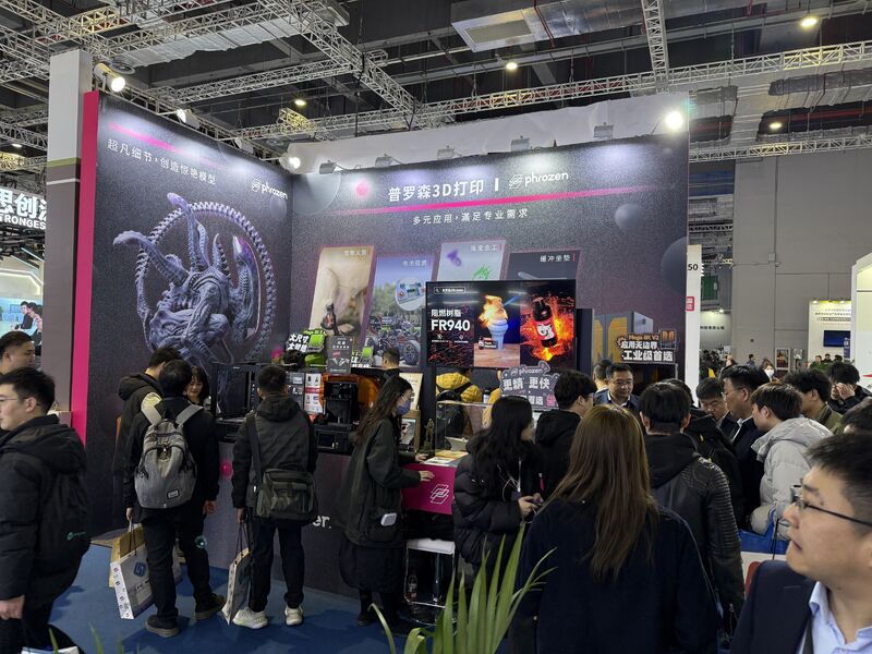 Phrozen booth at TCT Asia 2025 in Shanghai, China, with visitors viewing 3D printing displays.