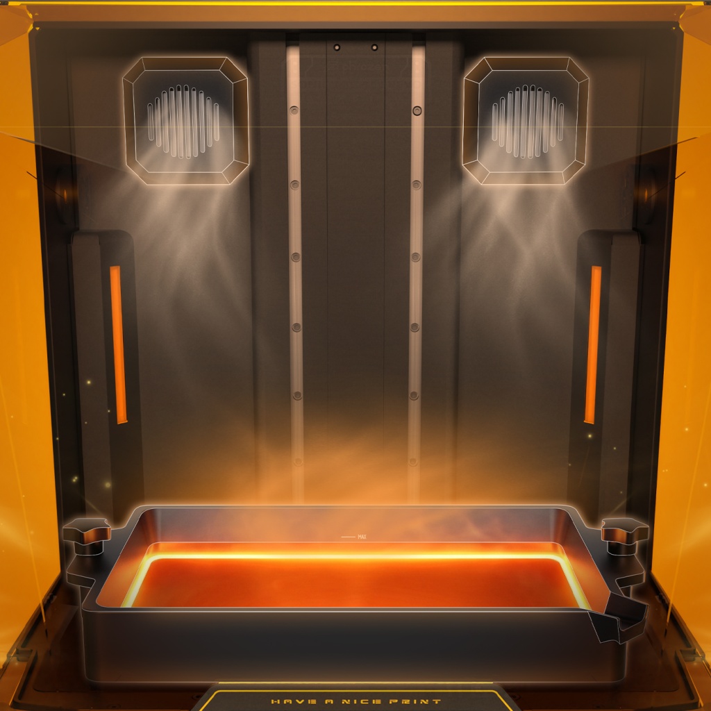 Heated resin vat and rear chamber vents illustrating the dual heating system.