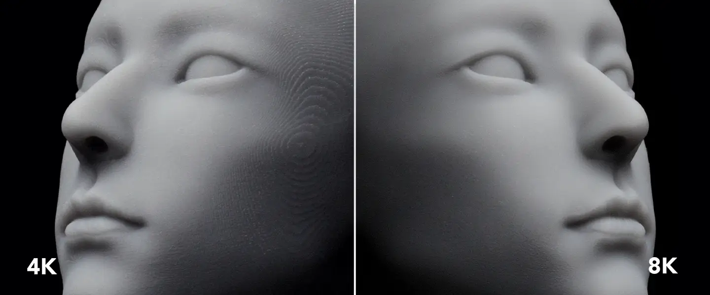 Side-by-side comparison of a 3D printed face model showing visible layer lines at 4K and a smoother surface finish at 8K.
