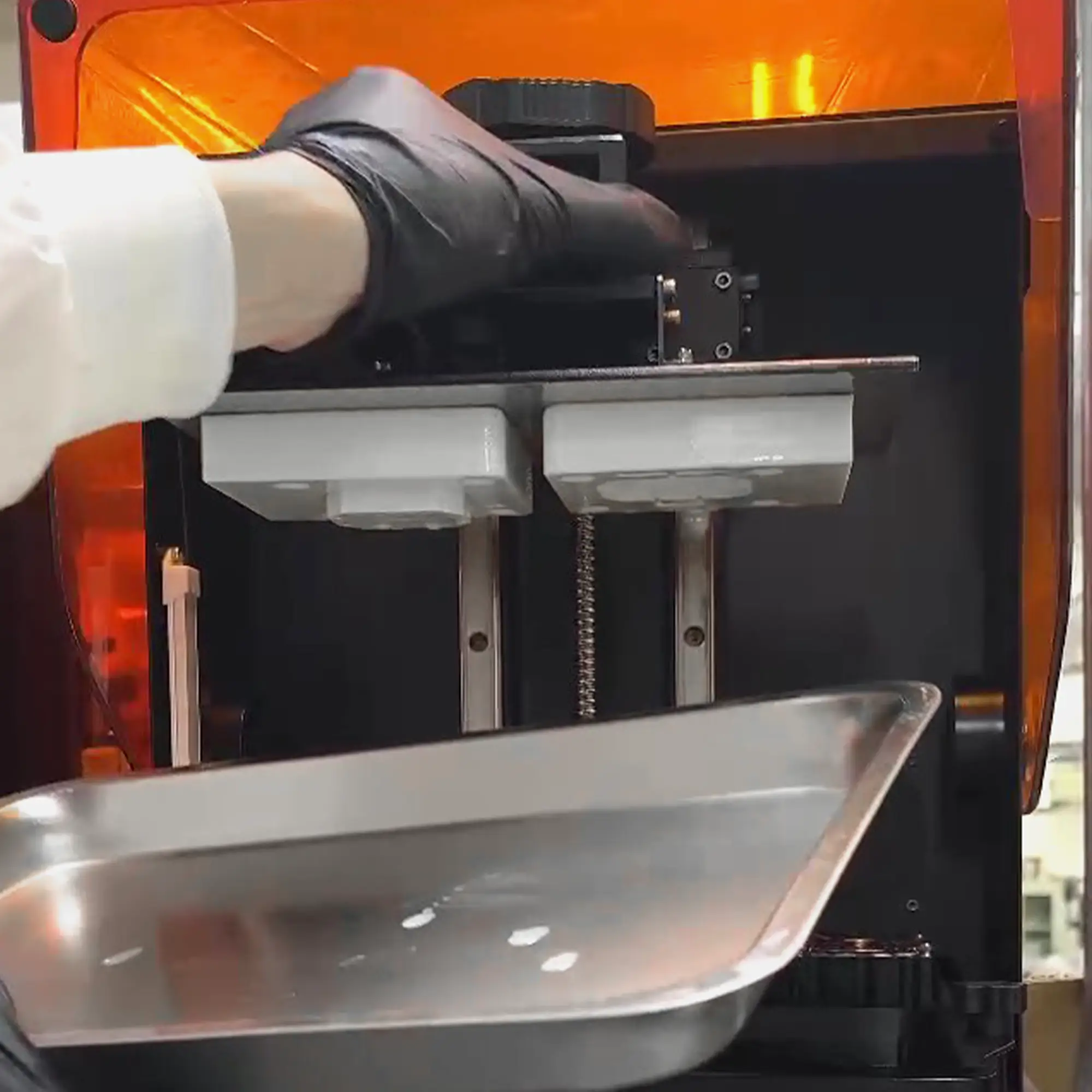 3D printer producing a white injection mold core made with Ceramic Pro Resin.