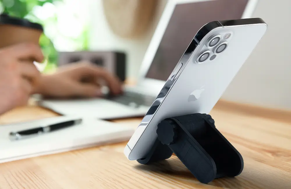 3D printed phone stand made with Phrozen x Loctite ONYX Impact Plus Resin, highlighting sturdy and reliable support.