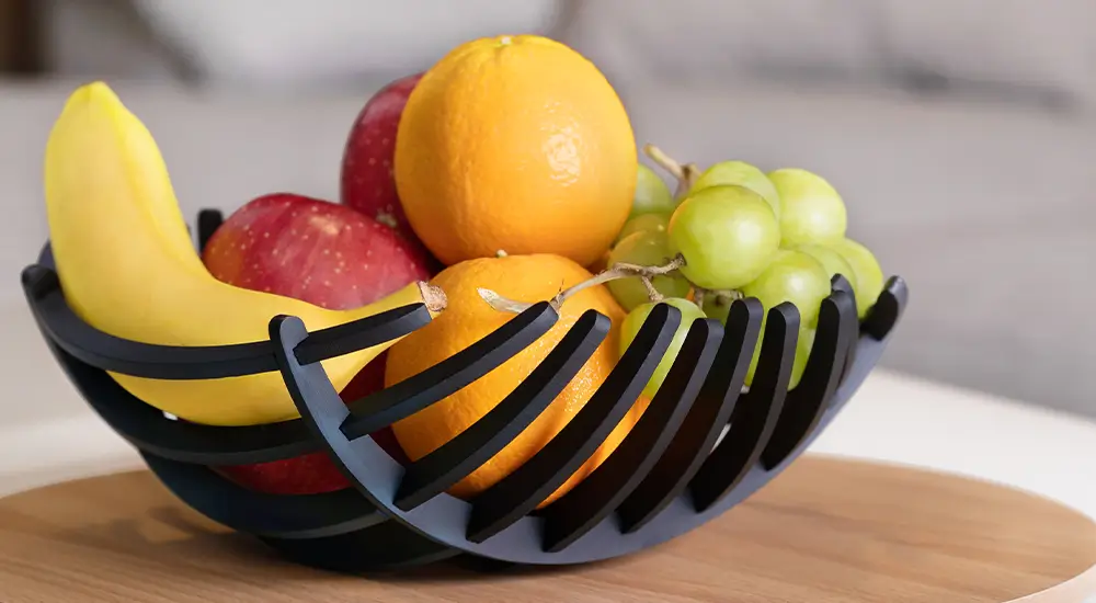 Fruit bowl printed with Phrozen x Loctite ONYX Rigid Pro410, highlighting strong and precise 3D printing.