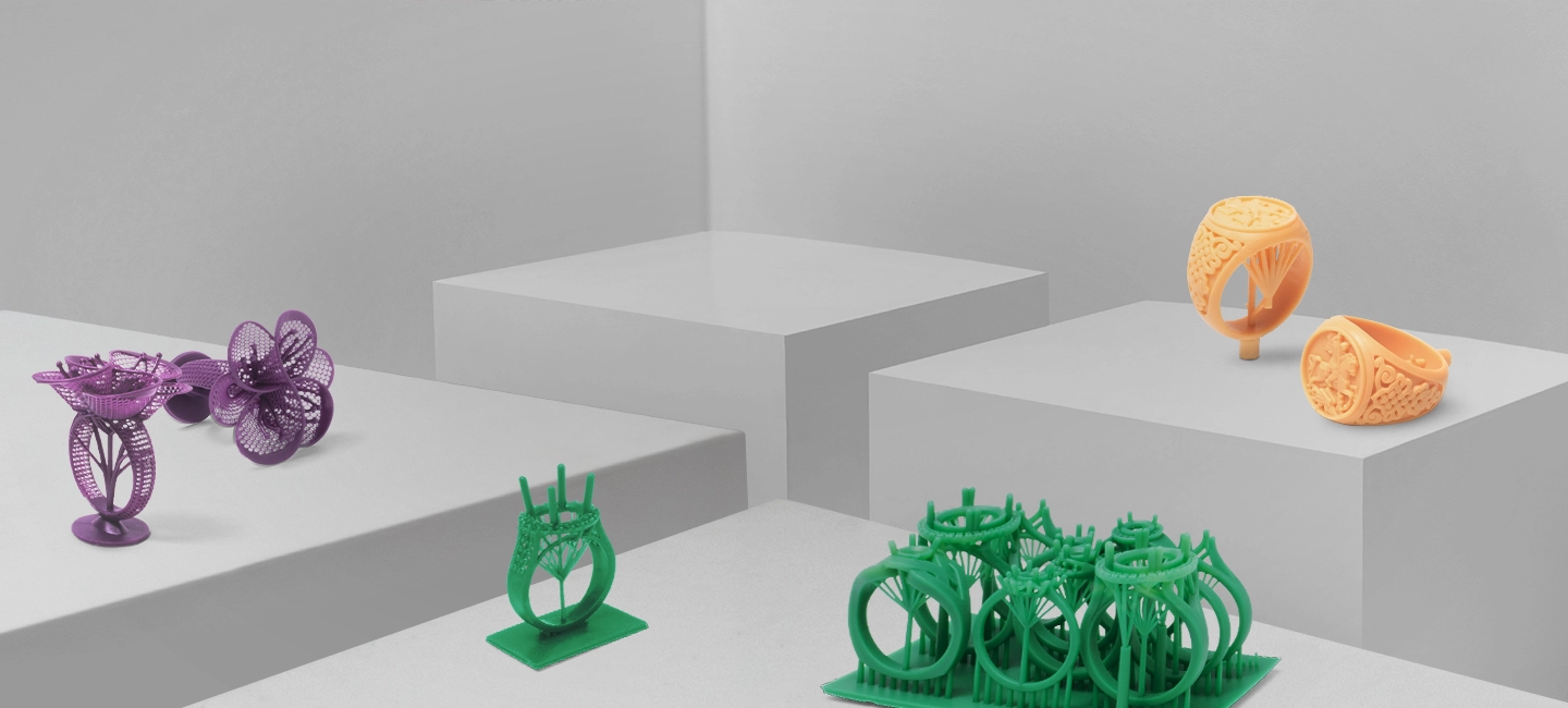 Phrozen Castable Resins Series banner with 3D-printed jewelry rings in multiple resin colors.